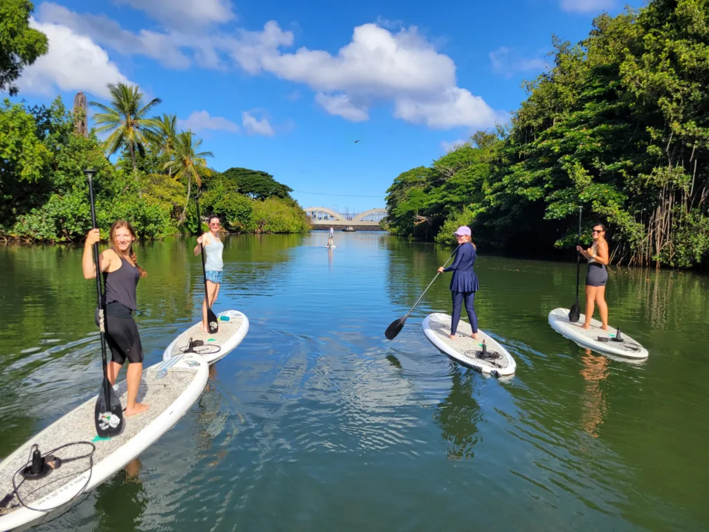 Morning paddle on river with soft sunrise light