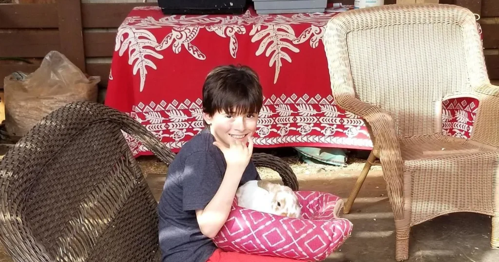 Children enjoying birthday party at petting zoo