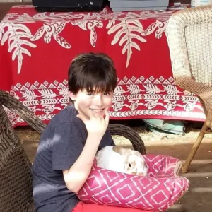 Children enjoying birthday party at petting zoo