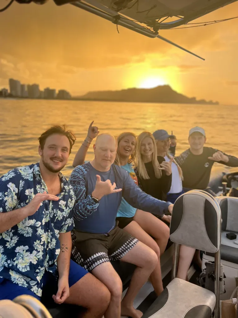 Small private boat cruising along Waikiki shoreline