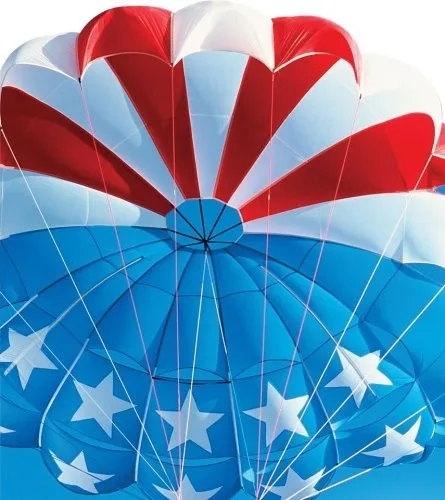 Parasail soaring above blue Waikiki waters and coastline