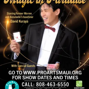 Magician performing sleight-of-hand tricks on stage