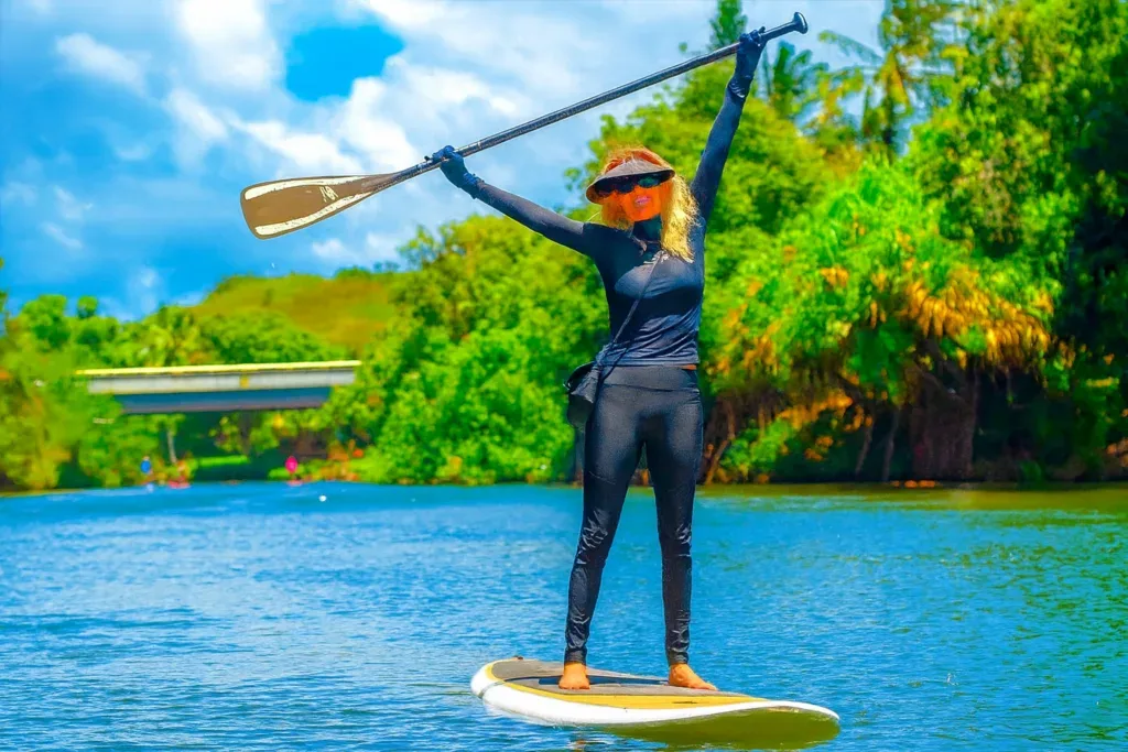 Stand up paddleboards available for rent on beach