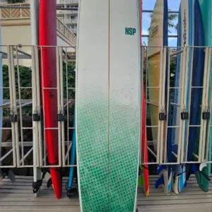 10-foot epoxy surfboard leaning against beach locker
