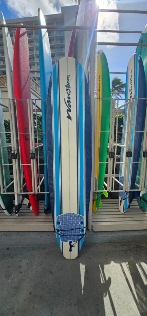 Soft 8-foot WaveStorm surfboard near rental locker