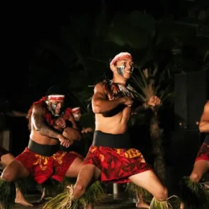 Chief Sielu leading fire twirling show