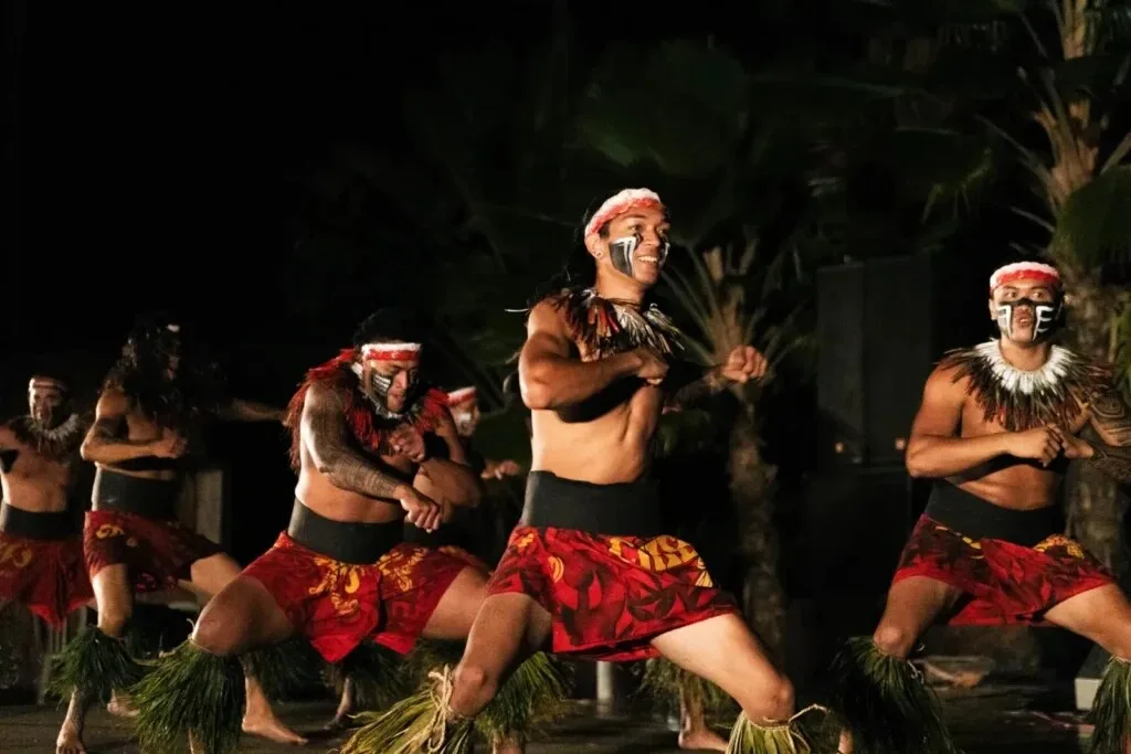Chief Sielu leading fire twirling show