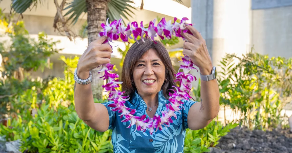 Fresh orchid lei ready for greeting guests