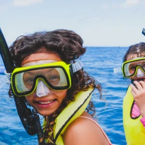 Luxury catamaran sailing along Oahu coastline