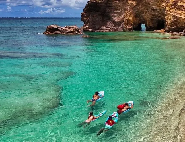 Person pedaling a Maui Sea Bike on ocean surface