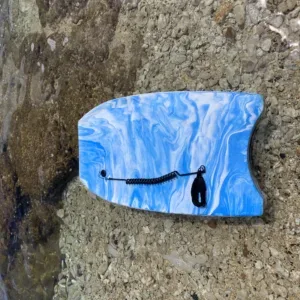 Medium sized boogie board on sandy beach