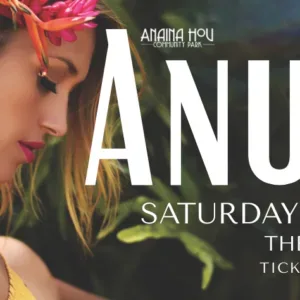 Anuhea performing live with guitar on stage
