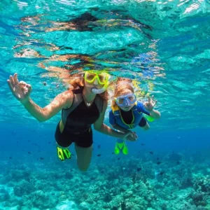 Small group snorkeling along Lanai coastline