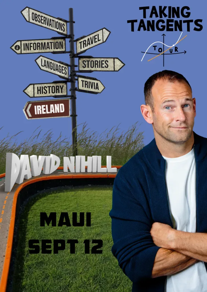 Comedian performing on stage with microphone in hand