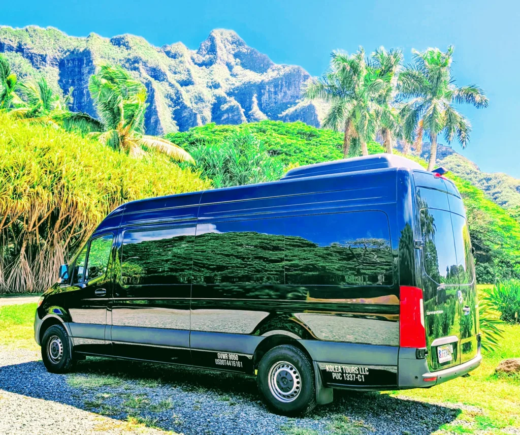 Tour van driving along Oahu coastline