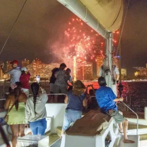 Boat watching fireworks display over Honolulu harbor