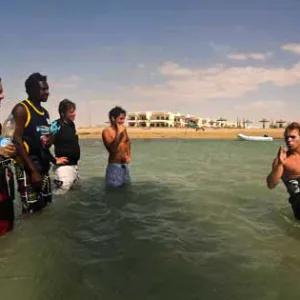Two friends learning kitesurfing in a lesson