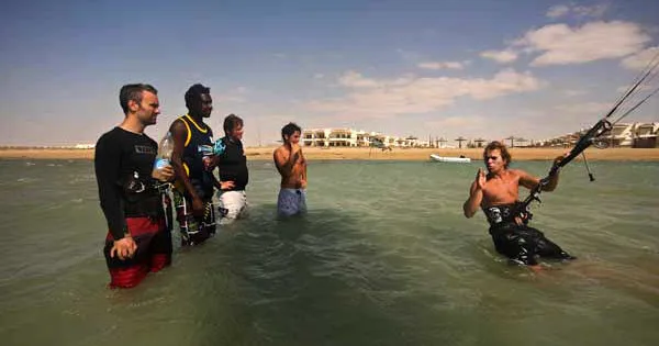 Two friends learning kitesurfing in a lesson