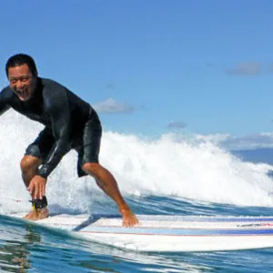 Various surfboards available for rent on beach