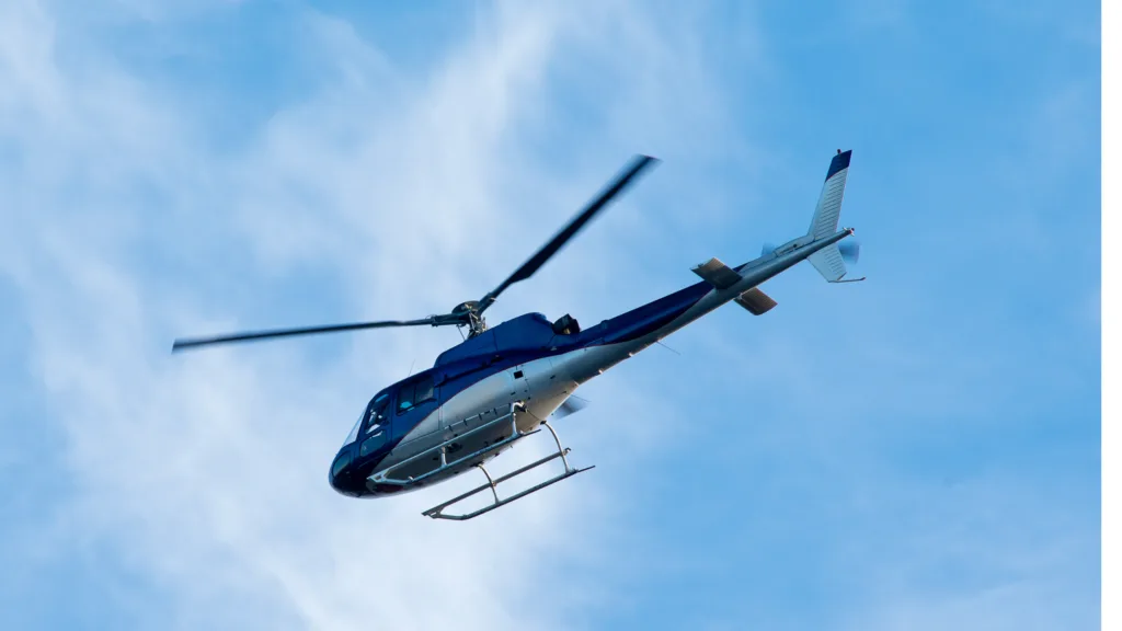 Helicopter flying over Oahu's coastline