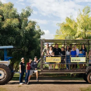 Farm tour wagon moving through Kahuku Farms fields