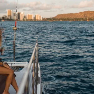 Catamaran sailing near Waikiki with Diamond Head view