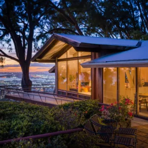 Private group enjoying sunset views from house deck