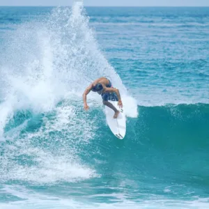Surf guide picking up guest from hotel in Hawaii