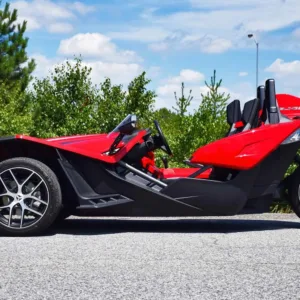 Three-wheeled convertible kart on city street