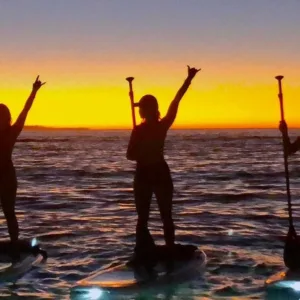 Sunset paddleboarding adventure in Waimea Hawaii