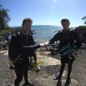 Scuba students preparing gear for open water dive