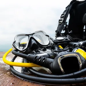 Complete scuba diving gear laid out for rental