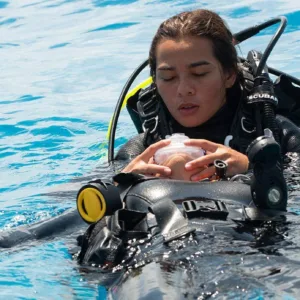 Diver practicing rescue techniques during a training course