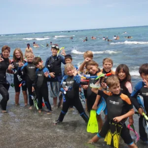Children watching Sea Camp Hawaii educational marine videos