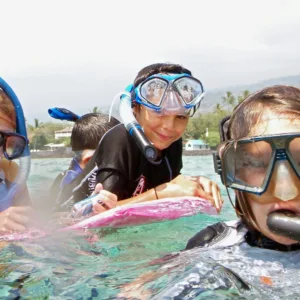 Children watching marine life educational video