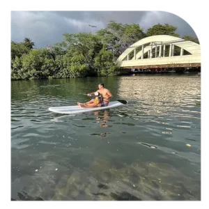 Kayaker exploring a coastal cove during rental period