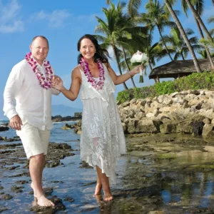 Couple getting married on a sailing vessel in Hawaii