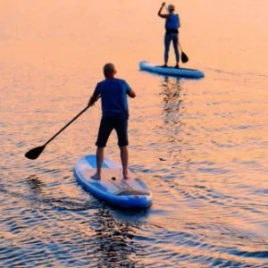 Two people taking a semi-private SUP lesson in Honolulu