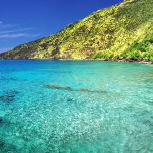 Boat anchored in Kealakekua Bay with clear water