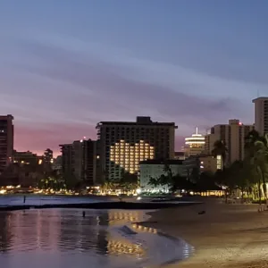Luxury Mercedes Sprinter van parked near Waikiki hotel