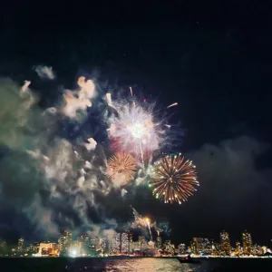 Boat cruising near Waikiki during a fireworks show