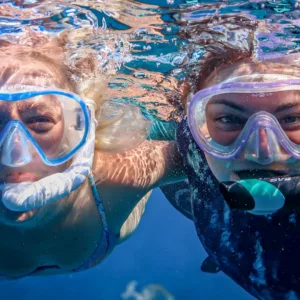 Adventure boat cruising along Kona coastline