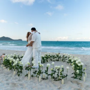 Custom floral proposal setup with candles and flowers