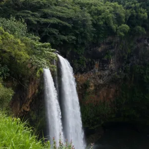 Wailua Falls cascading down tropical cliffs