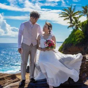 Photographer capturing family moments at scenic beach