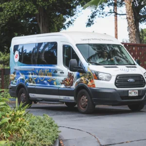 Large van transporting guests across Maui island