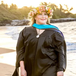 Individual posing for a portrait in a scenic Maui location