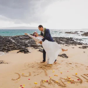 Couple exchanging vows during a beach wedding