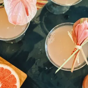 Bartender preparing craft cocktail with local spirits