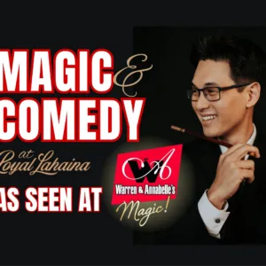 Magician performing sleight-of-hand on beach lawn